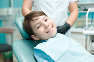 child at dentist early interceptive orthodontics concept